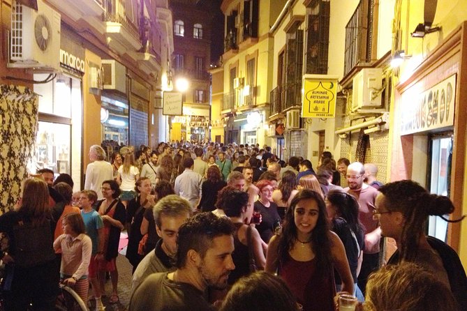 Triana Gourmet Tapas Tour in Seville - Triana crafts, bullfighting street energy, and Santa Ana church
