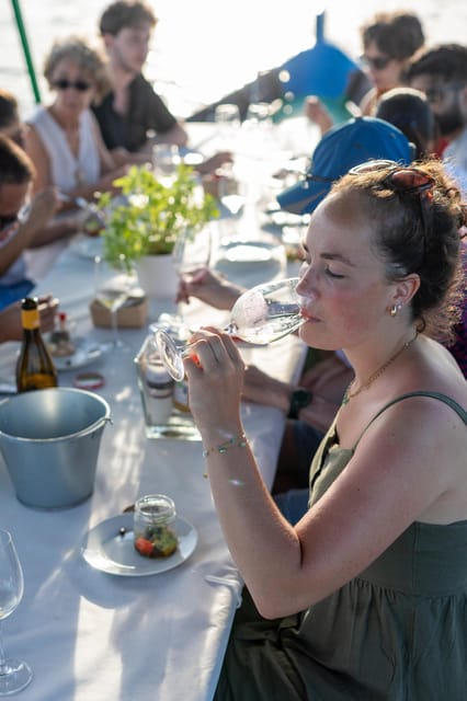 Valencia: Boat Ride with Valencian Wine Tasting & Tapas - Price and value: $57 for a boat, wine, and an aperitif