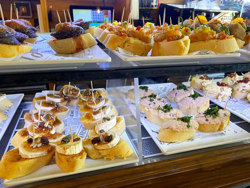 Valencia: Mysteries, Legends, & Local Tapas Experience - Plaza de la Almoina: the walk-above-history trick