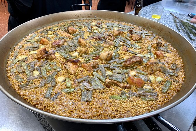 Valencian paella cooking class, tapas and visit to Ruzafa market. - Entering Valencia paella through Ruzafa, not a showroom kitchen