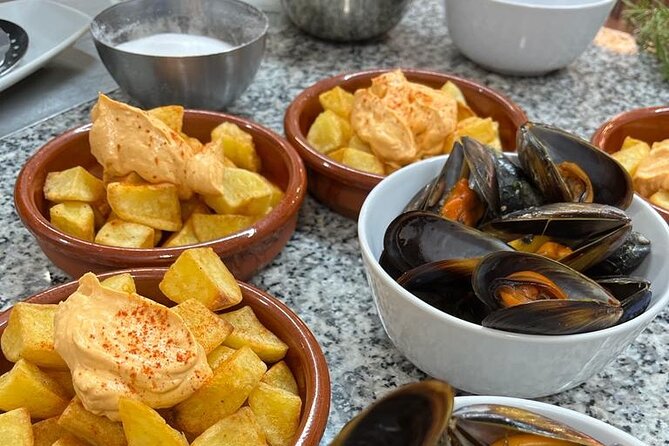 Valencian paella cooking class, tapas and visit to Ruzafa market. - The rice lesson you actually take home